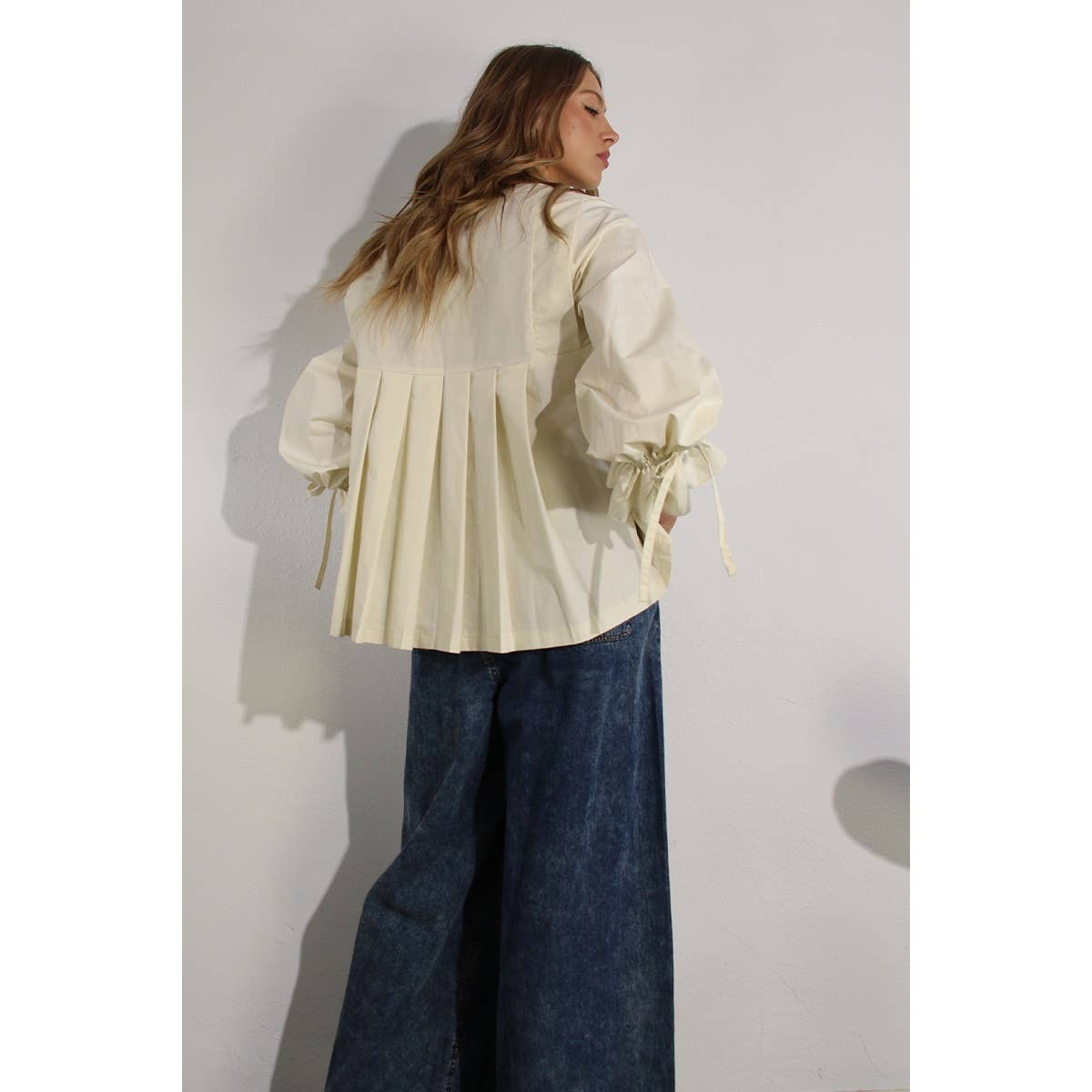 The Cassie Pleated In Back Cotton Blouse