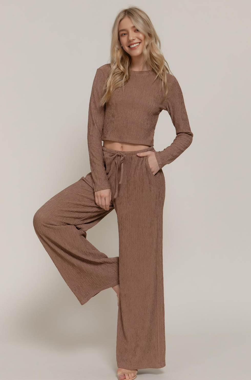 Women’s mocha ribbed lounge set with cropped top and wide-leg pants.